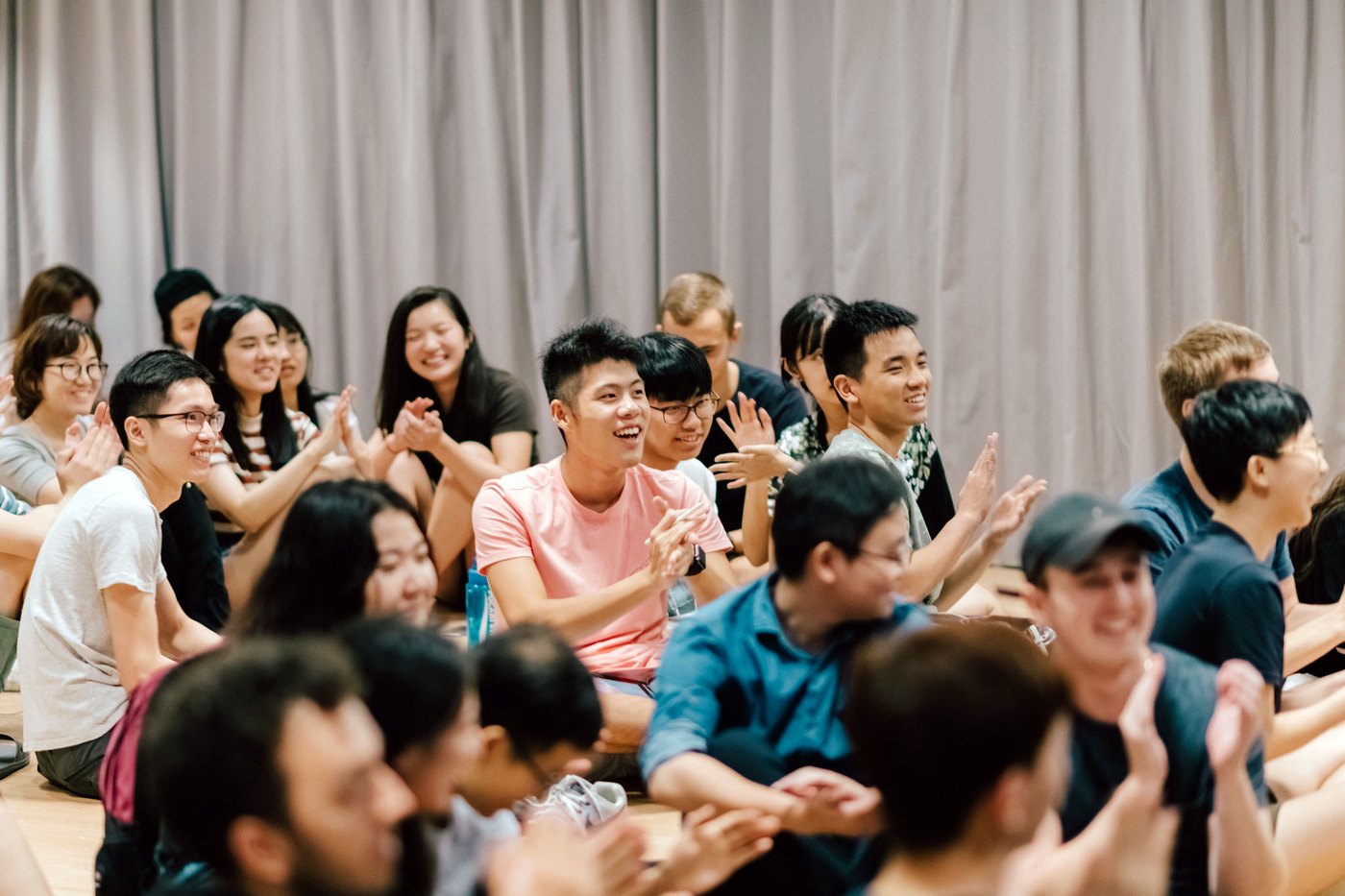 HKU students applauding at a residence seminar